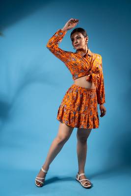 Orange floral crop top and ruffled skirt set 2