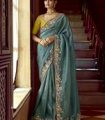 Teal blue border work organza festival wear saree