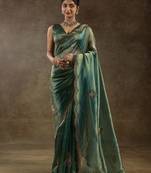 Green hand work reception wear saree with blouse