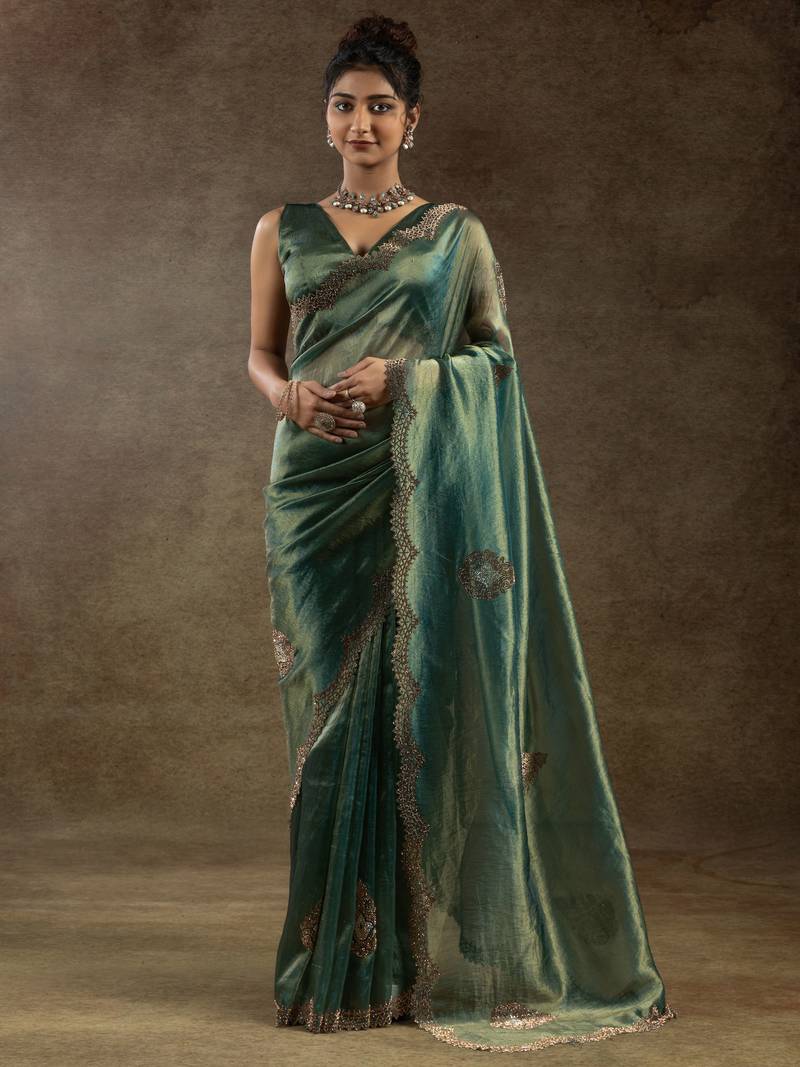 Green hand work reception wear saree with blouse