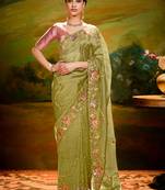Pista green thread embroidered organza saree with blouse
