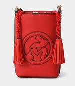 Red penelope sling bag by label ritu kumar