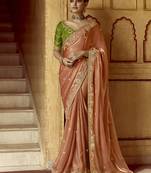Peach organza festival wear saree with green blouse