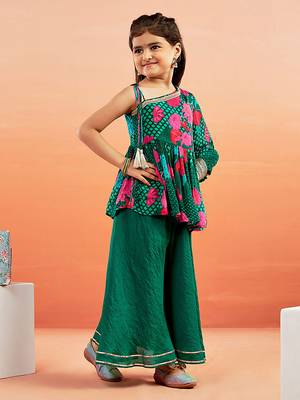  girls' green kurta palazzo set 1