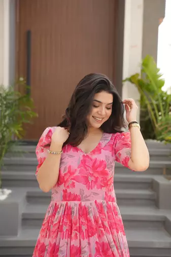 Peach georgette printed fully flared gown