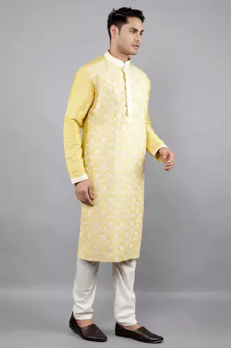 yellow colour woven design kurta sets