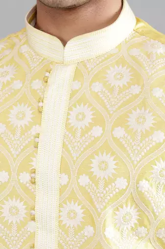 yellow colour woven design kurta sets
