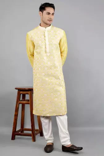 yellow colour woven design kurta sets