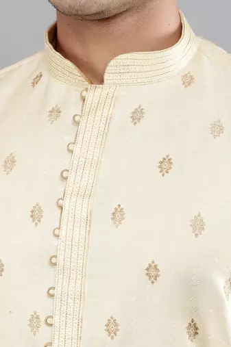 fawn colour woven design kurta sets