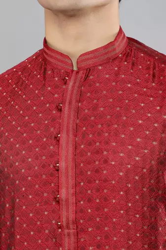maroon colour woven design kurta sets