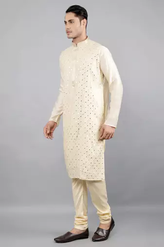 cream colour woven design kurta sets