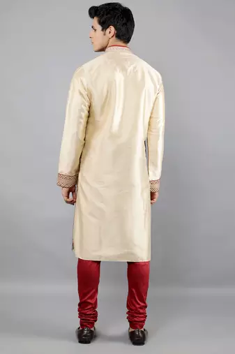 maroon colour woven design kurta sets