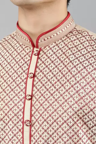 maroon colour woven design kurta sets
