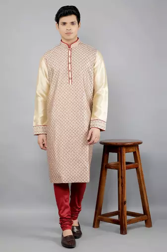 maroon colour woven design kurta sets