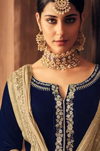 Blue embroidered velvet salwar kameez
