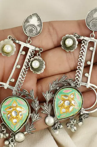 Meena white pearl black oxidize earrings