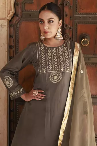 Green upadda silk aari embroidered kurta set