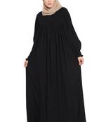 Black loose from chest arabian abaya with gather and smocky sleeves.