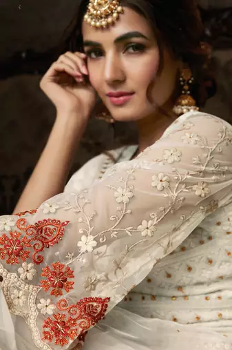 Cream embroidered georgette salwar kameez