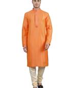    orange colour woven design kurta sets