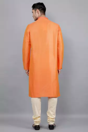    orange colour woven design kurta sets