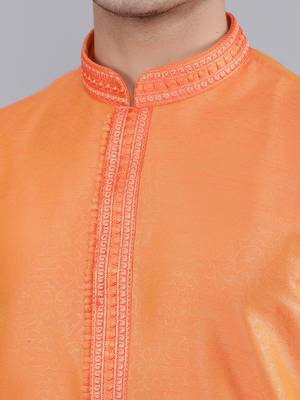    orange colour woven design kurta sets 4