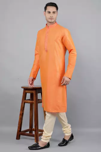    orange colour woven design kurta sets