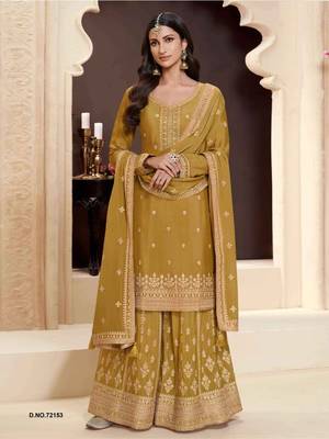 Yellow heavy embroidery semi stitched wedding palazzo suits 1