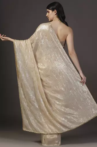 Nude and gold sequins hand embroidered georgette saree with unstitched blouse sets of 2