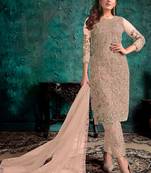 Beige embroidered net pant style salwar suit