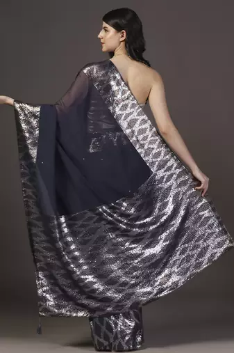 Black embellished dull silver and gold sequins hand embroidered georgette saree with unstitched blouse sets of 2
