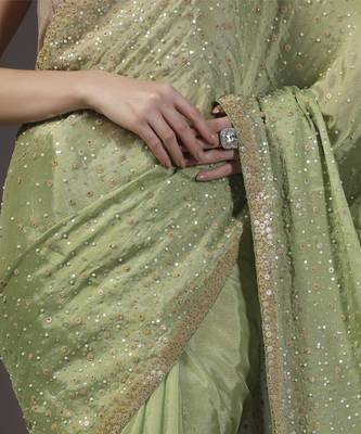 Green embellised tine dull sequins embroidered georgette saree with unstitched blouse sets of 2 4