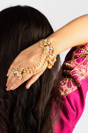 Mint wave haathphool in silk thread embroidery for pre-wedding occasions.