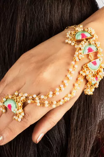 Mint wave haathphool in silk thread embroidery for pre-wedding occasions.