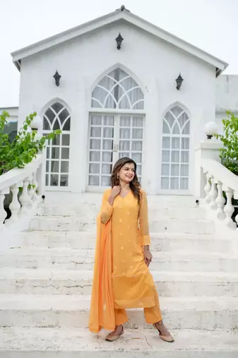 Light orange thread work kurta set