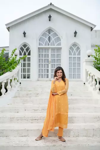 Light orange thread work kurta set