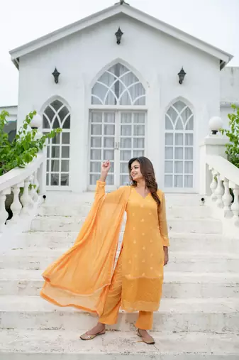 Light orange thread work kurta set