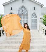 Light orange thread work kurta set