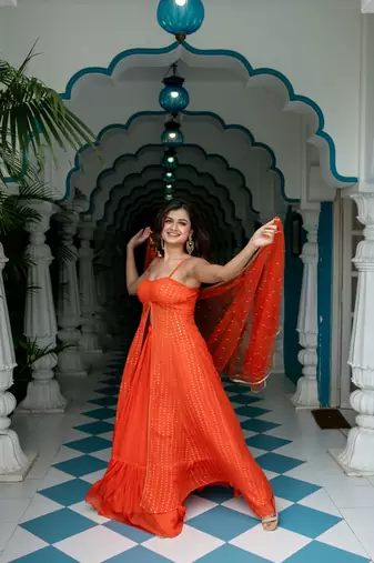 Orange long slit kurta with skirt