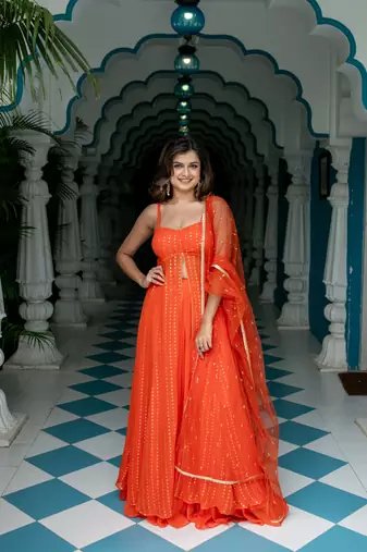 Orange long slit kurta with skirt