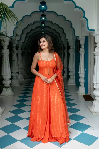 Orange long slit kurta with skirt
