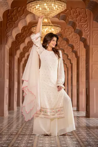 Cream multi color thread work kurta with pallazzo set