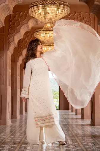 Cream multi color thread work kurta with pallazzo set