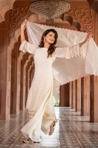 Cream multi color thread work kurta with pallazzo set