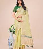 Light green organza woven zari work tassel saree