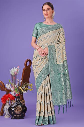 Cream lichi silk blend woven zari work tassel saree