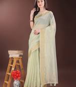 Light green organza woven zari work tassel saree