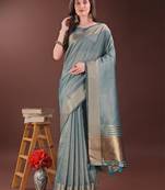 Sea green organza woven zari work tassel saree