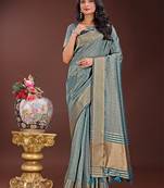 Sky blue organza woven zari work tassel saree