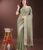 Green organza woven zari work tassel saree